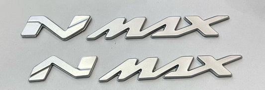 EMBLEMA NMAX PLATEADO